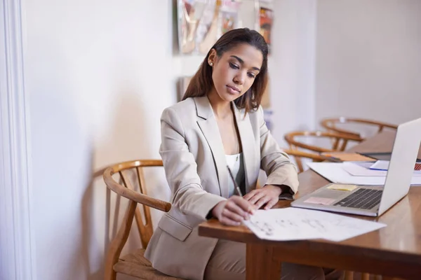 stock image Her creativity is flowing. a young fashion designer working on some sketches