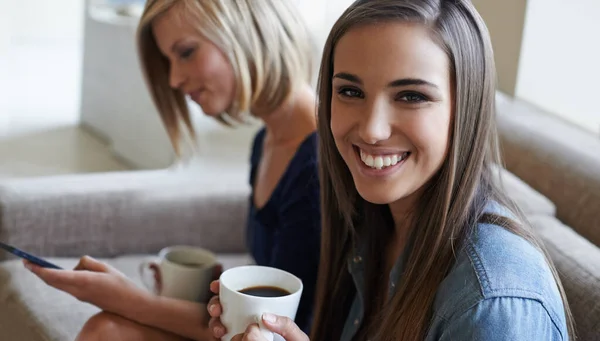 Catching Cup Coffee Two Young Woman Smiling Drink Coffee Couch — Stock Photo, Image