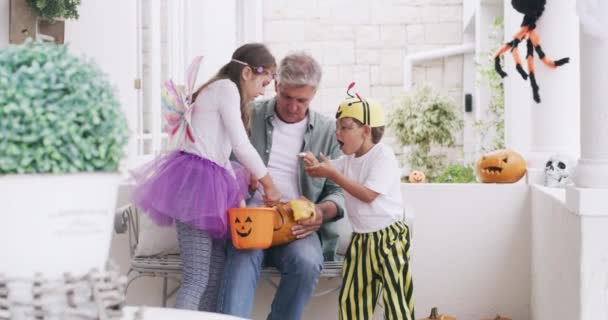 Children Halloween Costume Candy Holiday Celebration Senior Man Children Eating — Stock Video