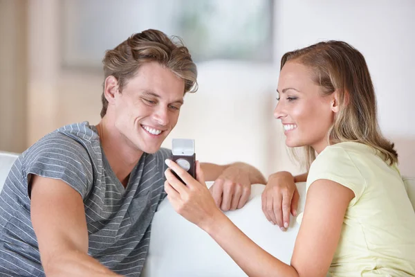 Sharing Memories Young Couple Looking Cellphone Living Room — Stock Photo, Image
