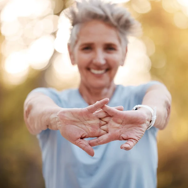 Senior Woman Runner Stretching Hands Park Running Exercise Wellness Smile — Stock Photo, Image