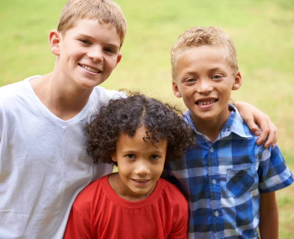 stock image Friends forever. Portrait of three young kids standing outside