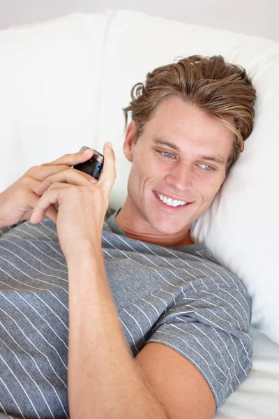 Text Made Day Handsome Young Man Smiling Holding Phone While — Stock Photo, Image