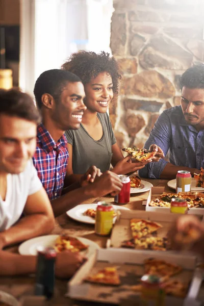 Friends eat pizza, lunch and food at restaurant with fun together on friendship date, party or celebration. Fast food, table and social gathering, event and dinner meal with soda in Chicago diner