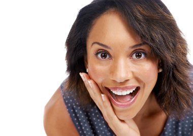 Thats fantastic news. Cropped studio portrait of a beautiful young woman expressing surprised excitement clipart