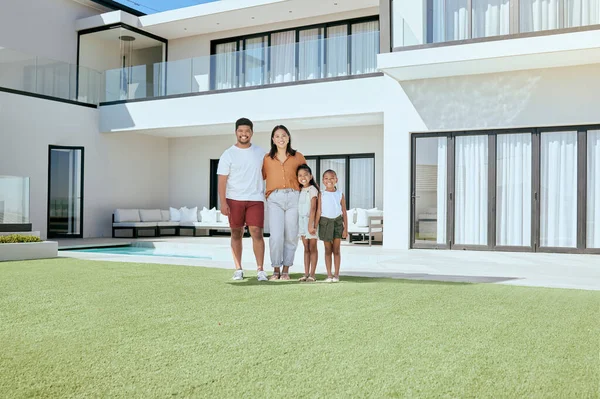 Happy family, outdoor portrait and real estate, new home and dream luxury house, building mortgage and investment in Colombia. Parents, kids and family homeowner, summer garden lawn and property loan.
