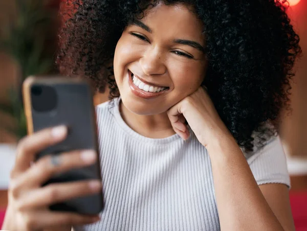 Black woman, phone and smile for selfie with happy face for social media profile picture or doing video call showing teeth, beauty and kindness. Female with smartphone for communication or blog post.