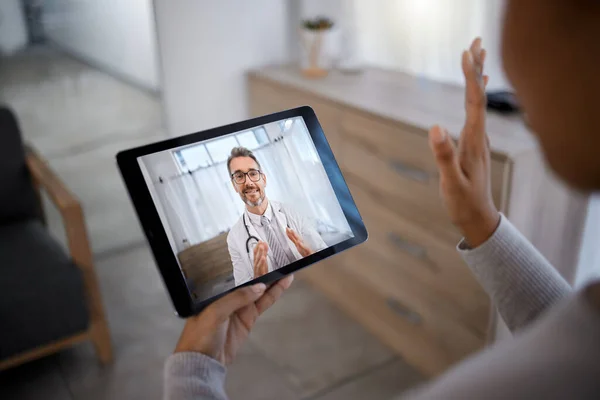 Doctor consulting patient on video call screen for telehealth communication, support and help with healthcare, insurance and advice. Medical man in zoom call on digital technology for virtual service.