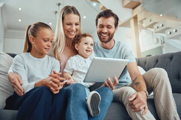 Love, tablet and family in living room, social media and smile for connectivity, online chatting and parents. Children, mother and father with kids, connection for happiness and quality time on sofa