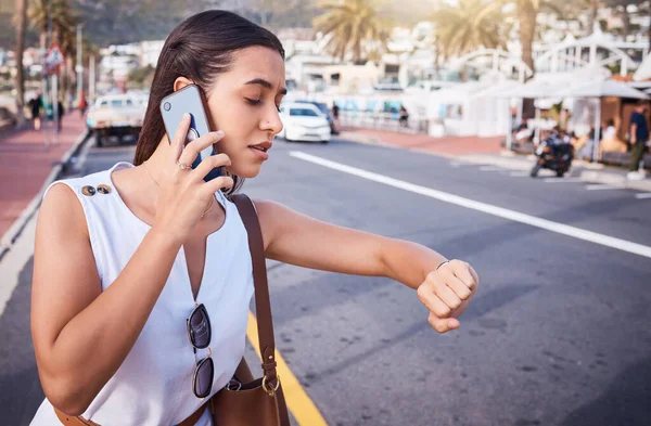 Woman, phone call and street with time, taxi and traffic for travel to work for business. Corporate employee waiting, using phone and watch on road, urban outdoor or metro for transportation.