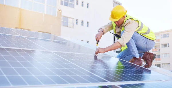 Engineer, man or solar panels for clean energy, maintenance for building or sustainability. Male technician, electrician or installation for alternative power, agriculture innovation or eco friendly.