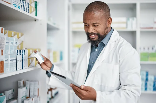 Pharmacy, medicine and black man with tablet to check inventory, stock and medication for online prescription. Healthcare, medical worker and pharmacist with pills, health products and checklist.