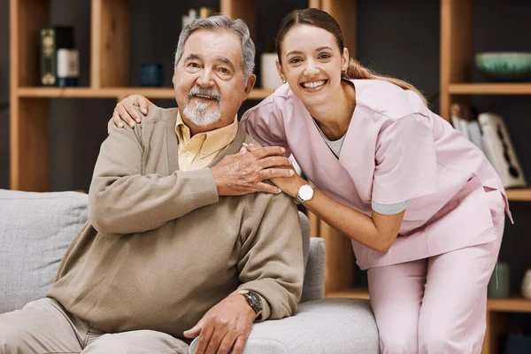 Healthcare, support and doctor with a senior man for medical attention, consulting and nursing from a house. Trust, hug and portrait of a caregiver with support for an elderly patient in retirement.