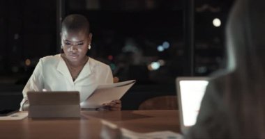 Black woman, tablet and night in office for research, planning and late with documents, web and focus. Corporate woman, mobile tech and paper for agreement, contract and report at insurance agency.