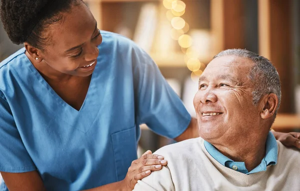 Help, support and medical with nurse and old man for retirement, rehabilitation or healing. Empathy, physical therapy and healthcare with patient and black woman in nursing home for caregiver service.
