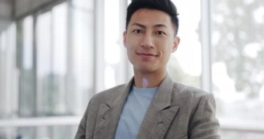 Startup, developer or portrait of a businessman with a smile in office of Singapore company. Happy, motivation or IT manager for target mindset, goal or success with his arms crossed in workspace