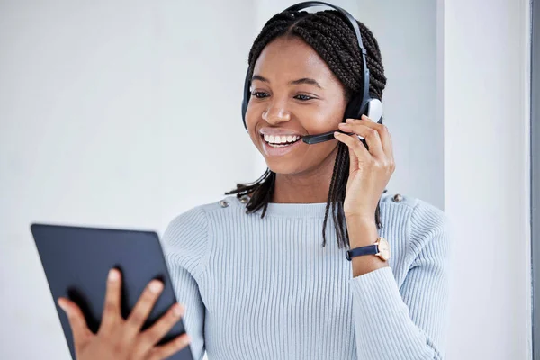 Business woman, digital tablet or call center headset in contact us help, customer support sales or b2b consulting app. Smile, happy or receptionist worker with technology on CRM office communication.