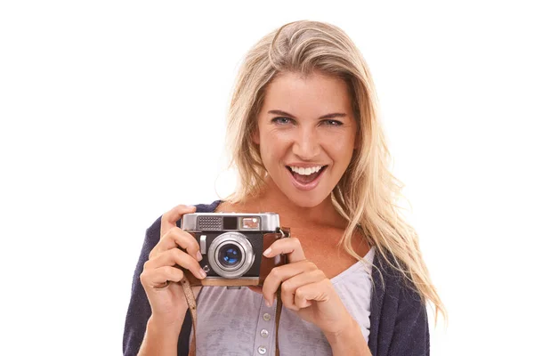 Photographer, studio portrait and woman with camera for vintage photo shooting, picture memory or lens photoshoot. Photography, paparazzi and model with emoji facial expression on white background.