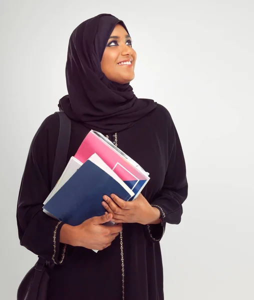 Muslim Student Thinking Islamic Girl Holding Books Studio Gray Background — Stok fotoğraf