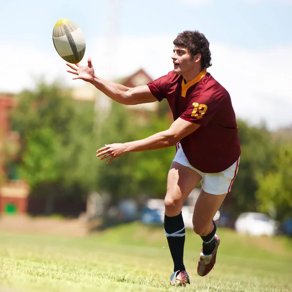 Passion Full Length Shot Young Rugby Player Receiving Pass — Stock fotografie