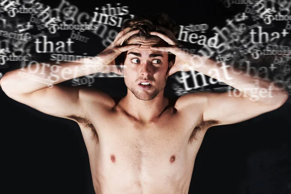 Hes Hearing Voices Young Man Holding His Head Surrounded Words — Stockfoto
