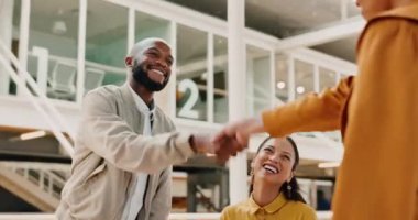 Handshake, partnership and business people in office with a deal, agreement or greeting. Meeting, corporate and professional employees shaking hands for welcome, onboarding or thank you in workplace