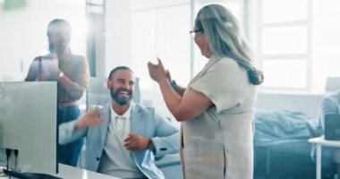 Business people, high five with support and applause for success in the workplace, team at desk with computer. Win, collaboration and employee group celebrate bonus or deal with target goal in office.