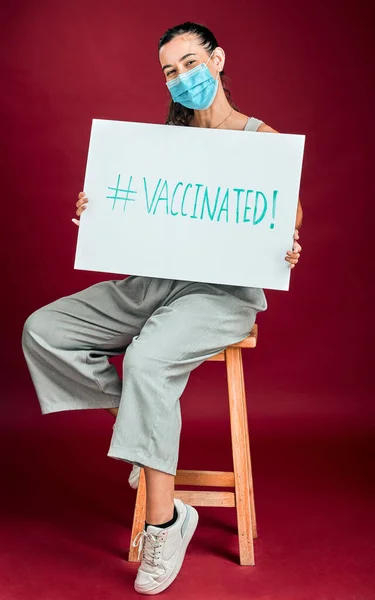 Mixed Race Covid Vaccinated Woman Showing Holding Poster Wearing Surgical — Stockfoto