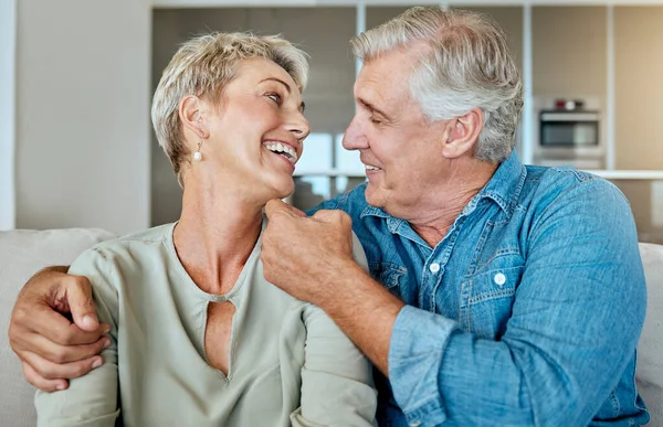 Happy Relaxed Mature Retired Couple Talking Laughing Together Living Room —  Fotos de Stock