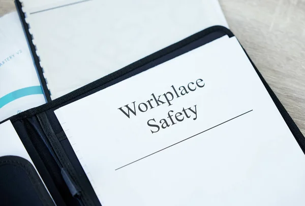 Workplace safety 101. a document with Workplace Safety on it in an office