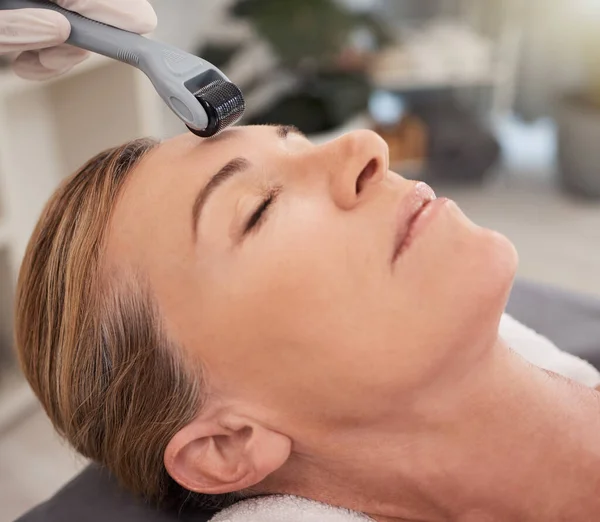 Its one one of the leading treatments in anti-ageing therapy. Closeup shot of a mature woman enjoying a micro-needling treatment at a spa