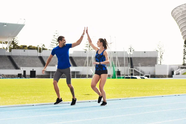 Awesome Full Length Shot Two Young Athletes High Fiving While — 스톡 사진
