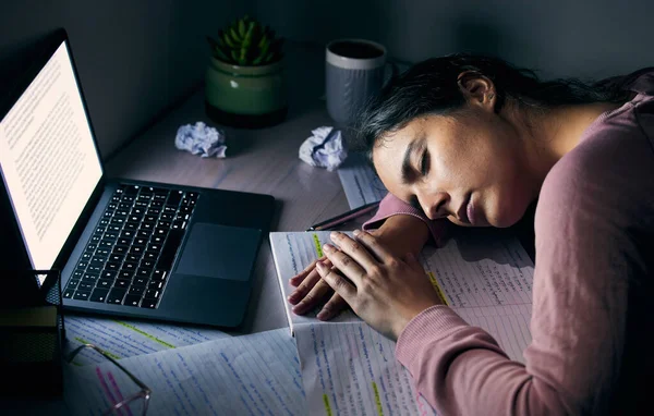 Woman, laptop and student sleeping, night and burnout for studying, mental health and overworked. Female, girl or academic tired for test, report or lady with computer, late evening or notes for exam.