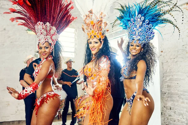 Samba, music and dance with women at carnival for celebration, party and festival in Rio de Janeiro. Summer break, show and creative with brazil girl group for performance, new year and culture.