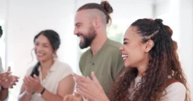 Winner, applause and success with a business team clapping together in their office for motivation. Wow, growth and partnership with a man and woman employee group in celebration of a goal or target.