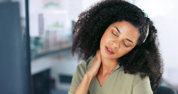 Black woman, neck pain and burnout from business stress while at office desk for massage to relief pain, fatigue and tired body. Female entrepreneur stretching for muscle discomfort or health problem.