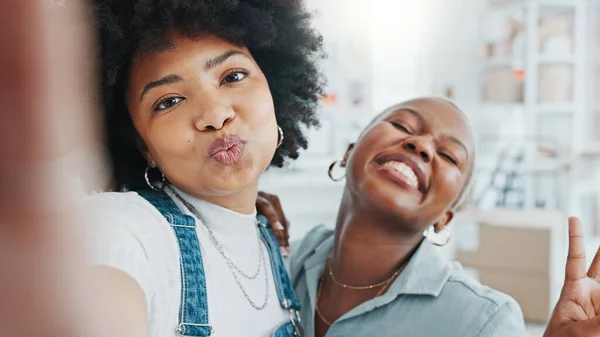 Friends, influencer and women take a selfie for social media posts and share memories with online followers. Influencers, happy and black woman with a cool vlogger afro best friend taking pictures.