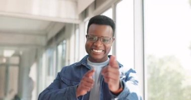 Black man, business portrait and pointing for choice or win while walking in office with smile for motivation. Professional manager hiring, recruitment and finger to vote or make decision for winner.