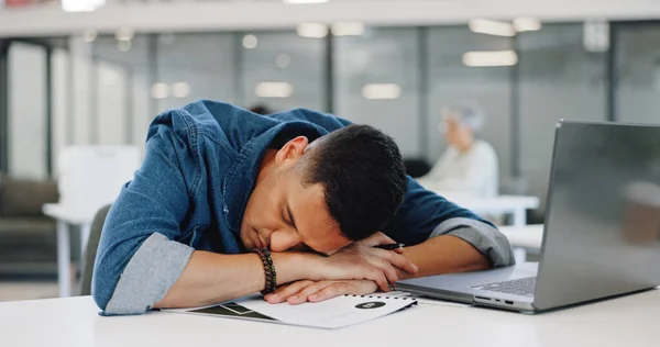 Businessman, yawning or desk sleeping in modern office, digital marketing startup or advertising branding company. Tired, fatigue or exhausted creative designer and laptop technology or bored burnout.