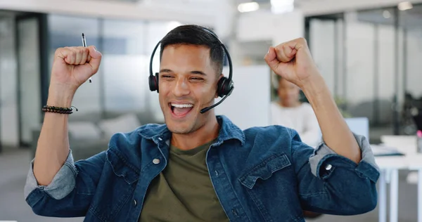 Businessman, call center and sale celebration in telemarketing, financial broker or consultant at office. Happy employee agent in applause for deal success, investment or customer service on compute.