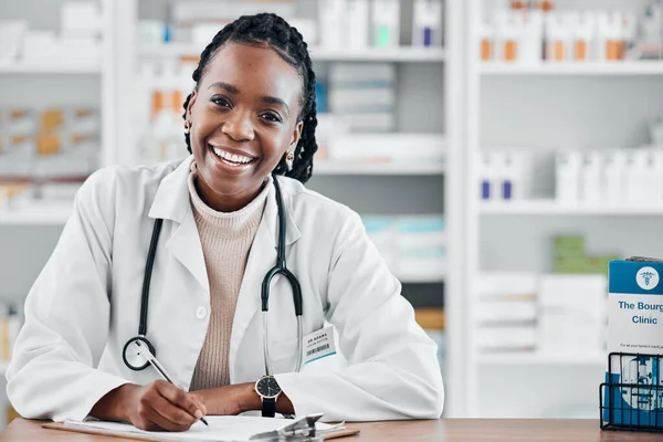 Black woman, pharmacist portrait and smile consultant with stock and health research for wellness. Happy, pharmacy worker and documents of a pharmaceutical employee ready for healthcare work.