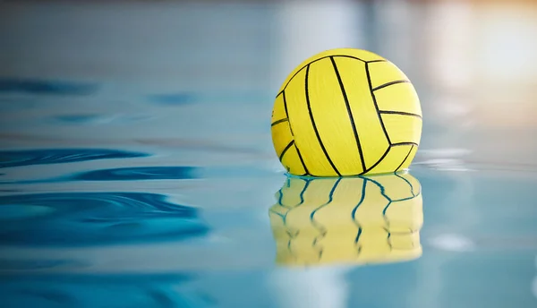 Water polo, sports and ball on swimming pool surface for game, competition and practice for match. Aquatic sport, fitness mockup and professional equipment for training, exercise and motivation.