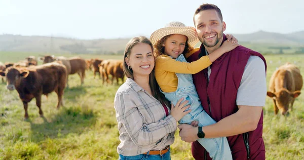 Mother, father or girl bonding on farm with cows in nature environment, agriculture or countryside sustainability landscape. Portrait, smile or happy farmer family with cattle for meat, dairy or beef.