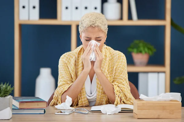 Work, covid and woman at desk tissue paper blowing nose, tired and overworked from flu or cold. Sick, exhausted and office employee with allergy or health risk from illness, burnout or sinus problem
