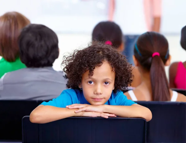 stock image His dreams will come true with the right education. Portrait of a young schoolboy looking bored in class