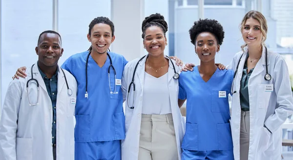 Team of doctors, diversity portrait and healthcare hospital services, mission and group values. Support, love and nurses or medical professional employees, black woman and face of USA clinic staff.