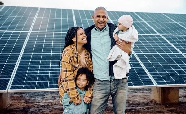 Black family, kids or solar energy with parents and daughter siblings on a farm together for sustainability. Children, love or electricity with man and woman girls bonding outdoor for agriculture.