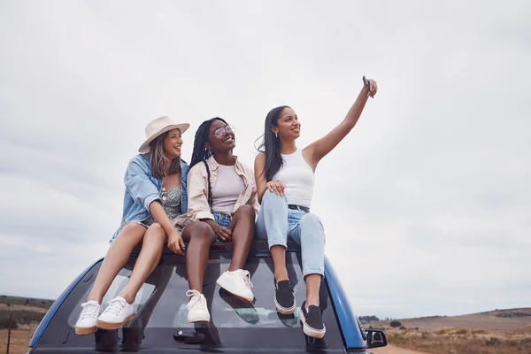 Road trip selfie of women friends on car roof with sky mockup for social media, group travel and vacation. Profile picture of diversity youth or people in Africa safari, desert or countryside journey.