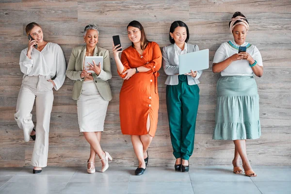 stock image Technology, waiting room and business women in recruitment for job search opportunity or career inclusion. Diversity, equality of corporate people in Human Resources office on computer and phone call.