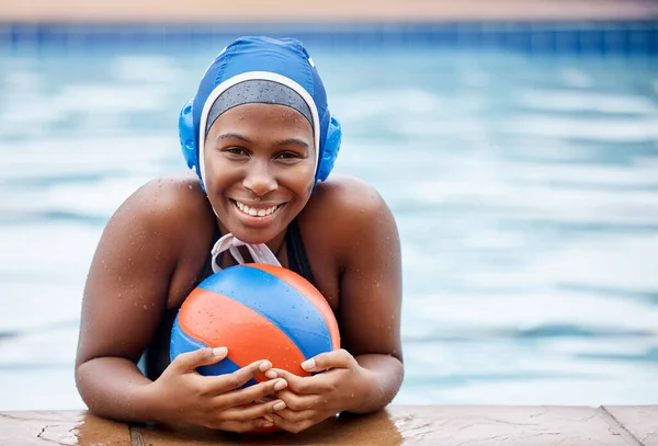 Portrait, water polo or happy black woman in swimming pool for exercise, workout or practice in sports fitness. Relax, ball or healthy African girl swimmer with motivation, smile or training goals.